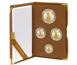 A set of four coins in an album.