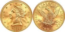 A gold coin with the image of an eagle on it.